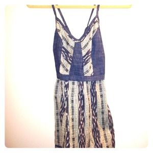 Crossed spaghetti strap above knee dress