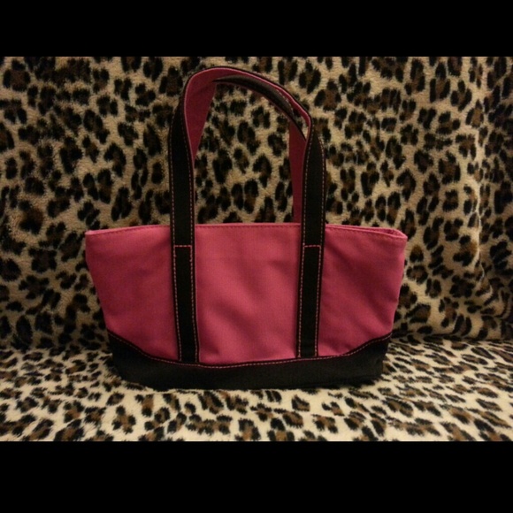 Pink and black purse