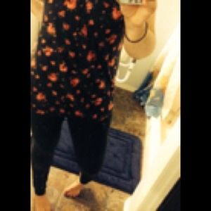 Long, floral tank with a fun, crocheted back <3