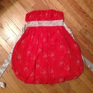 Strapless coral and gold dress