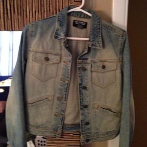 Distressed denim jacket
