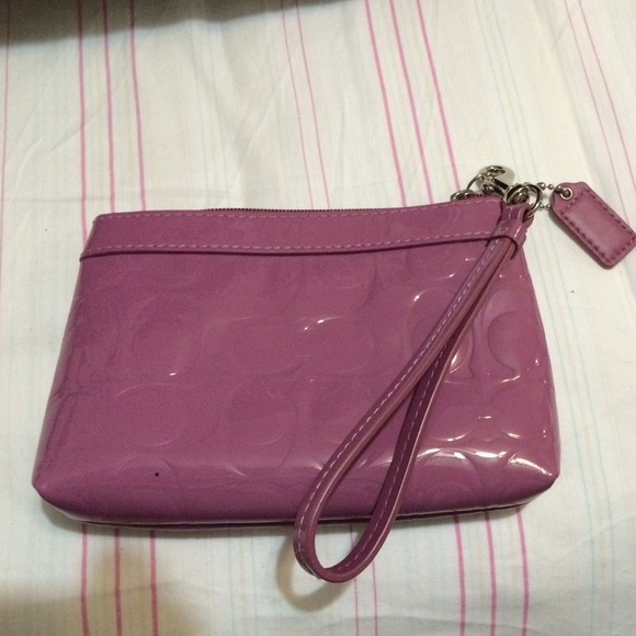 Purple patent coach wristlet