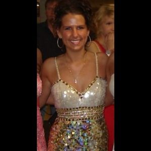 Gold and white sequin prom dress with modest slit