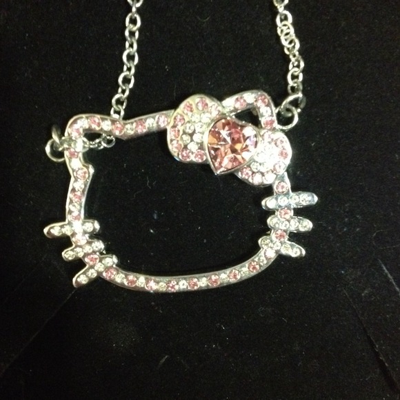 Pink and white real stone Hello Kitty necklace.