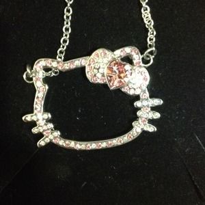 Pink and white real stone Hello Kitty necklace.