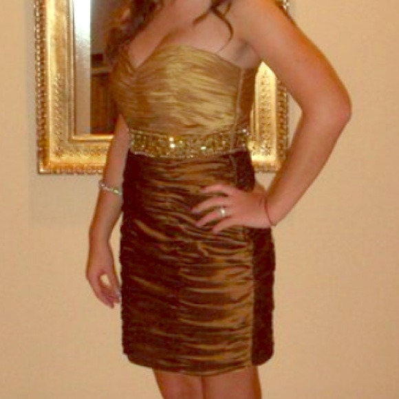 Terani couture ruched beaded cocktail dress.