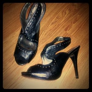 Black studded heels by Carlos Santana, size 8.5