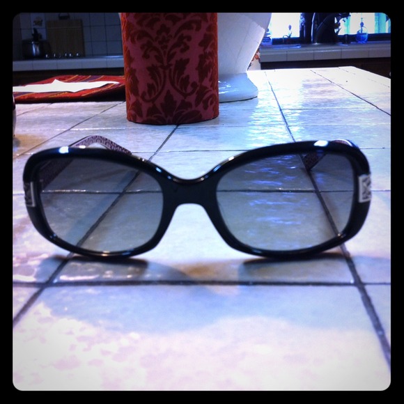 Slightly used real Coach black sunglasses.