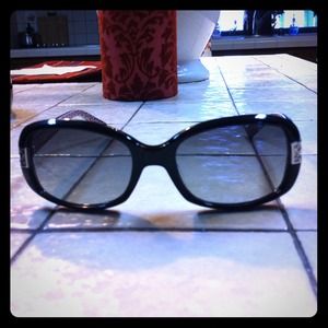 Slightly used real Coach black sunglasses.