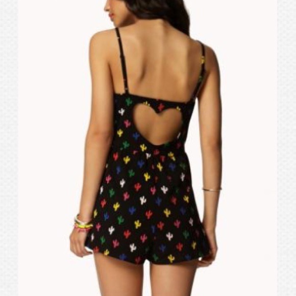 Forever 21 Dresses & Skirts - New heart cut out romper