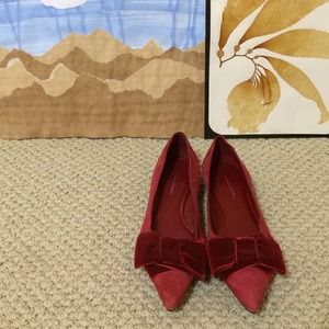 Red suede pointy toed flats