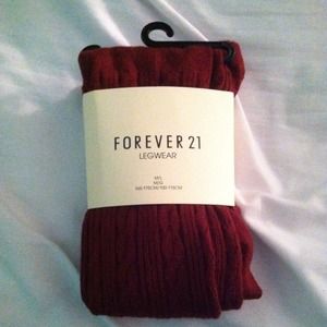 Burgandy cable knit tights.