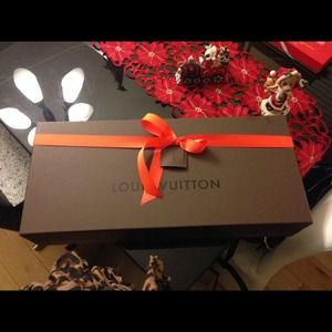 Louis Vuitton box with red bow