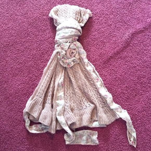 Pink scarf with floral outline and flower