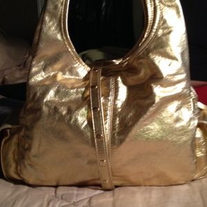 Gold hand bag