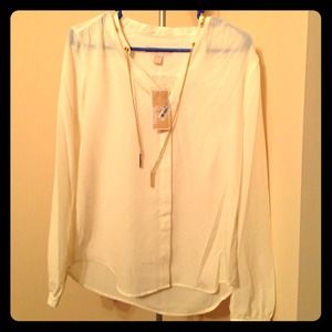Brand new with tags Michael kors size m cream