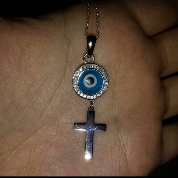 Evil eye cross pendant