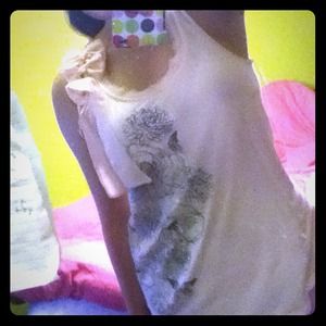 Cute sleeveless blouse with bows!