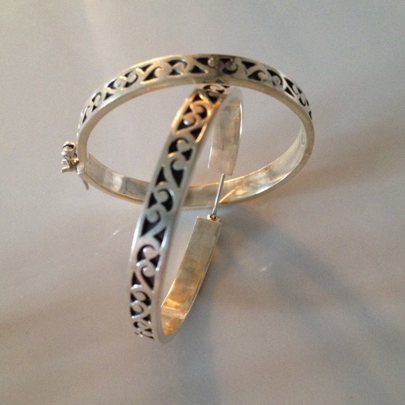 1.5" Designer Lois Hill silver hoop earrings.