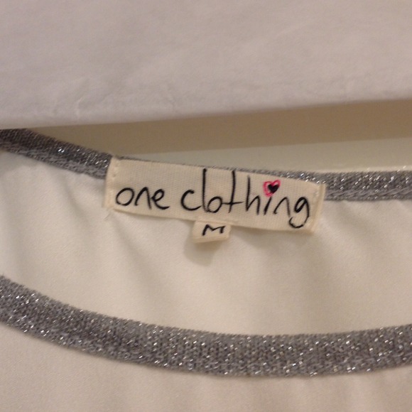 Medium white flowy short sleeve blouse. - Picture 2 of 2