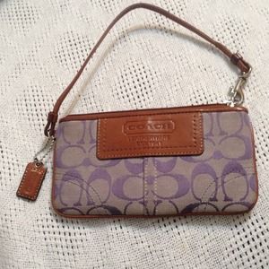Purple coach wristlet