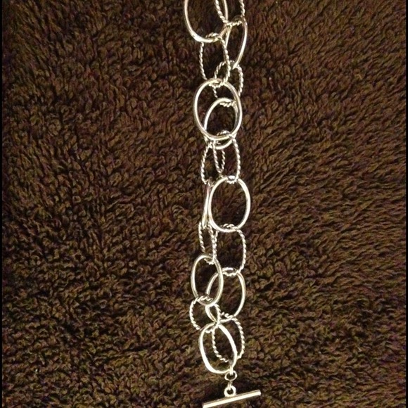 Silver tone bracelet.