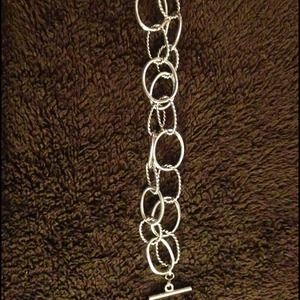 Silver tone bracelet.