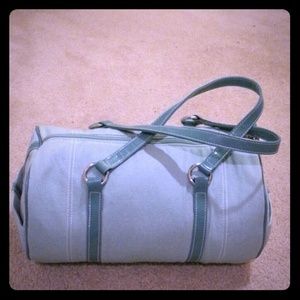 Duffel bag with leather trimming and straps!