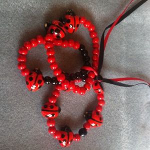 3 bead  braclets red and black Lady Bugs