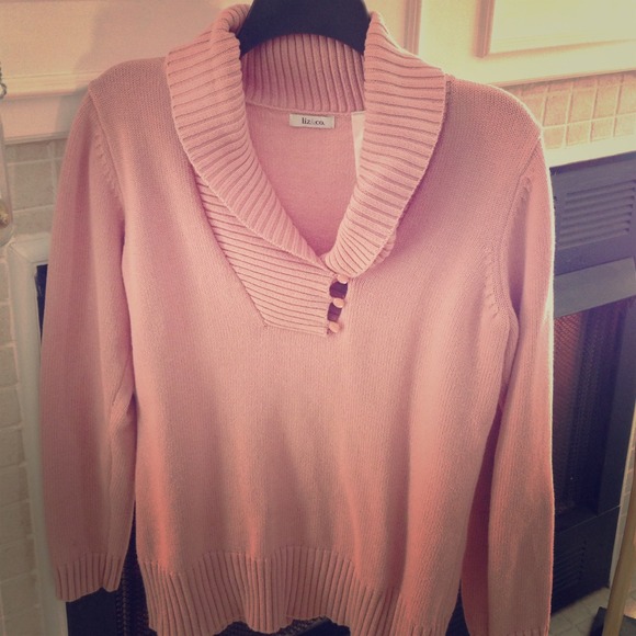Pink sweater with plunge neckline