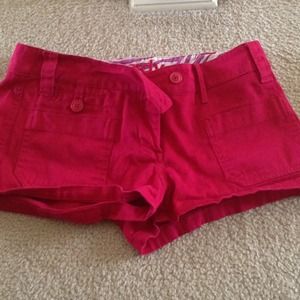 Delia's dark pink shorts.