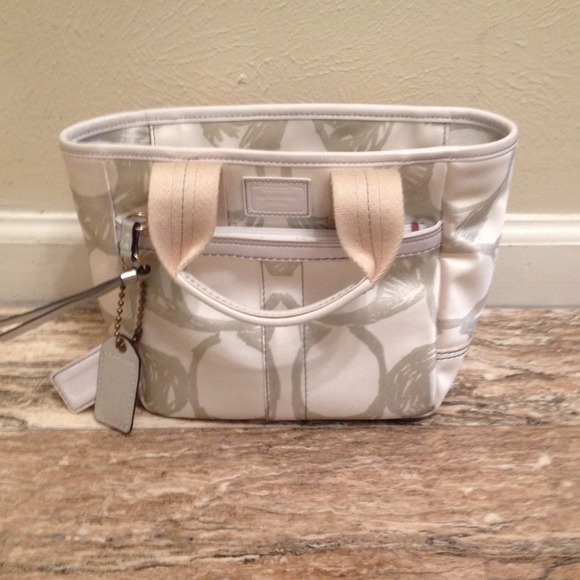 Authentic white and silver coach handbag