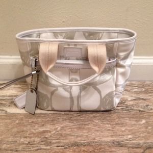 Authentic white and silver coach handbag