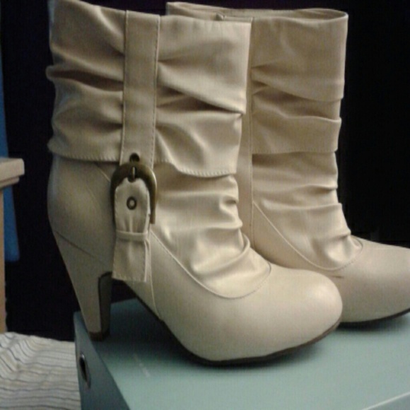 White leather heeled boots