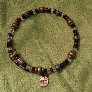 Red, white, and blue Alex and Ani +energy bracelet