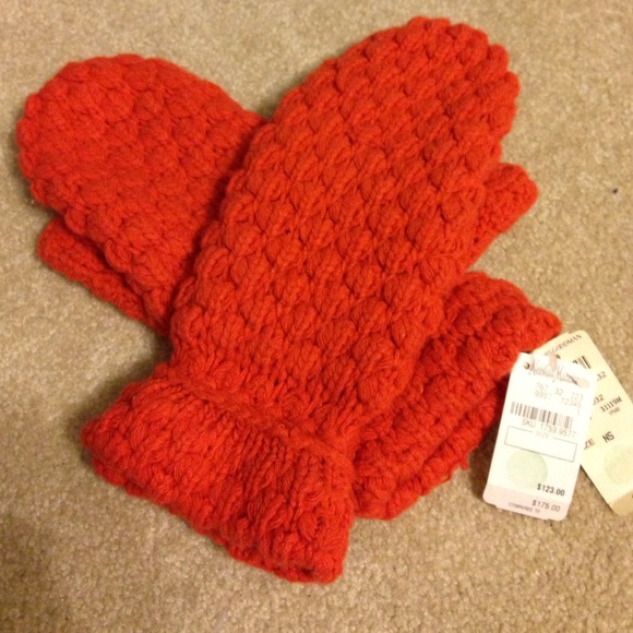 Orange Cashmere knit mittens.