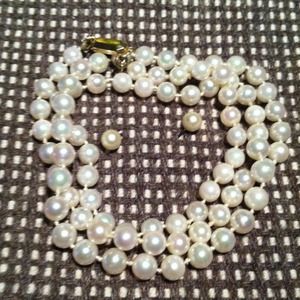 Genuine String pearls, 14 Karat clasp.earrings