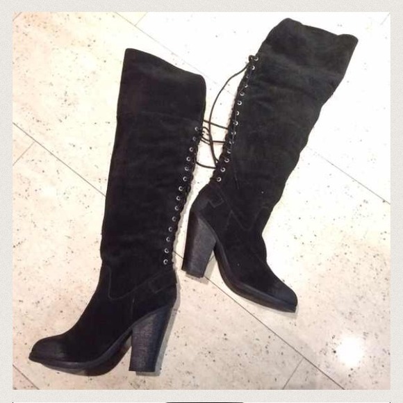 Distressed suede tall boot.