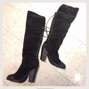 Distressed suede tall boot.