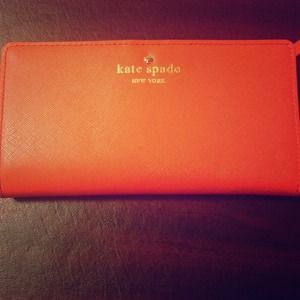 Kate Spade- bright orange and white wallet