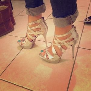Silver heels. Brand new! Size 7.  Zipper back