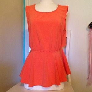 Orange, open back, peplum top