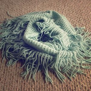 Knitted. Fringe infinity scarf