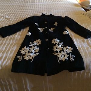 Suede coat black with off white flowers.