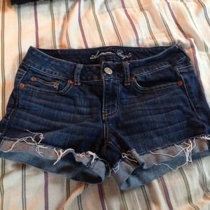 mid rise dark wash American eagle shorts