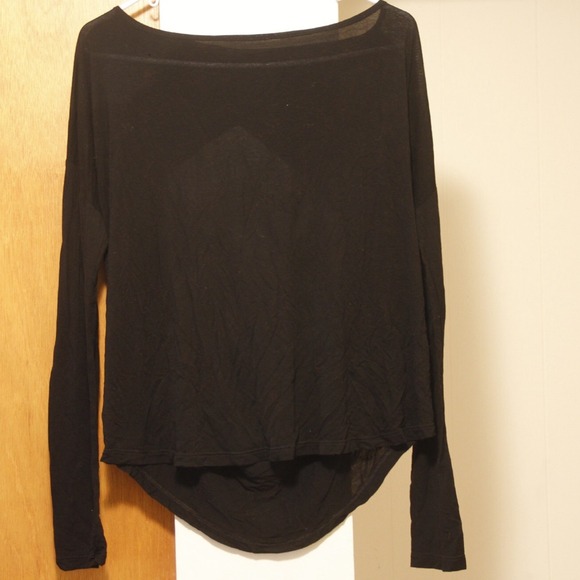**SOLD** Semi sheer black top with open back.