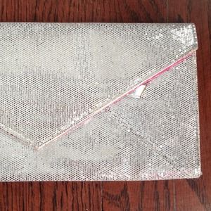 Silver glitter clutch