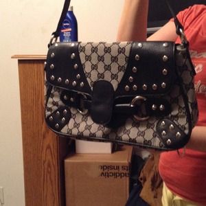 Retired print authentic Gucci horse bit purse