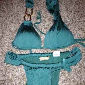 Never worn Aqua De Coco emerald green bathing suit
