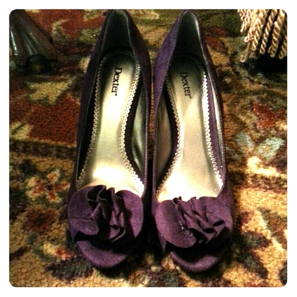 Purple peep toe wedges with flower.